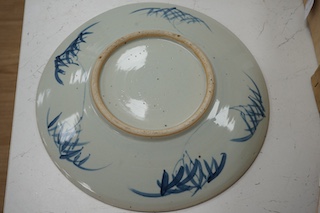 A 19th century Chinese blue and white dish, 37.5cm diameter. Condition - some glazing pitting in manufacture